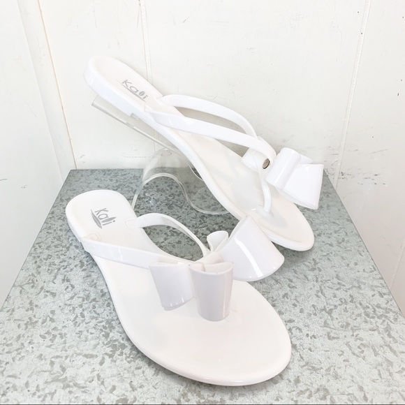 white jelly flip flops